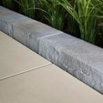 Techo-Bloc Röcka carved-stone retaining wall installed by Smarter Scapes in Nashville TN - Edge Riviera color option