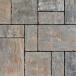 Unilock Westport concrete paver patio installed by Smarter Scapes in Nashville TN - Endura Fossil color option