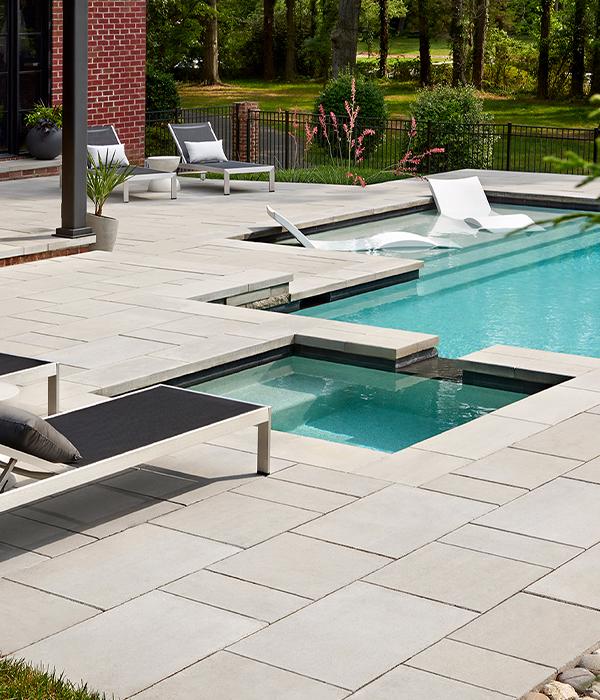 Techo-Bloc poolside patio slab design inspiration for Nashville TN backyards