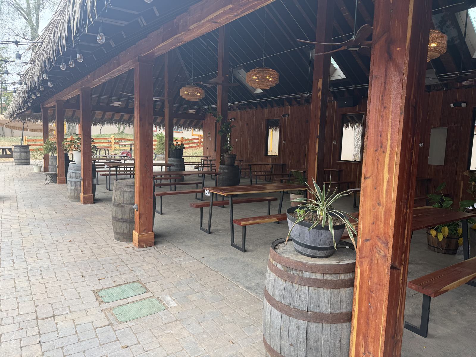Soldier-course paver edge meeting the covered pavilion slab