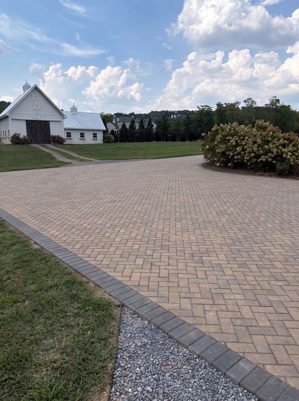 Concept render of Holland Stone herringbone pavers on a parking apron in Franklin TN