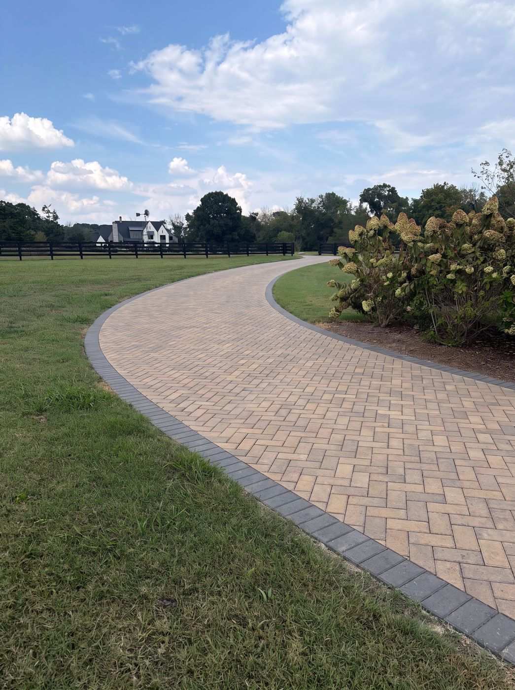 Concept render of Keystone Holland Stone paver overlay on a curved driveway in Franklin TN
